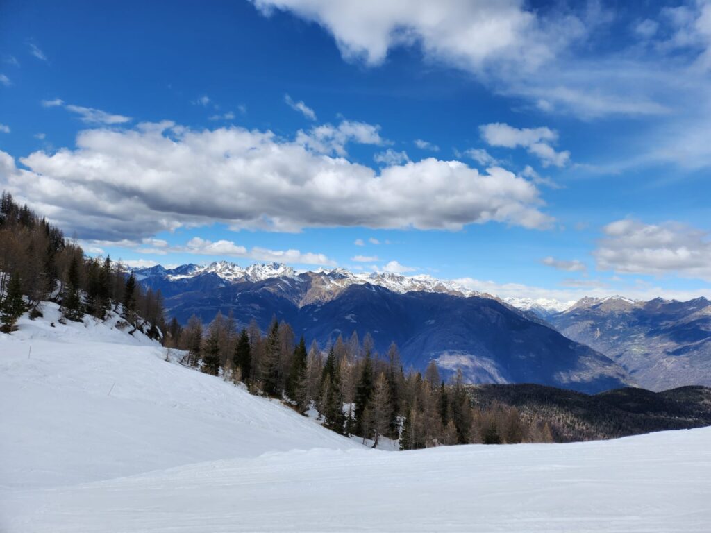 A landscape shot of snow-covered hills in Aprica, Italy, taken during a school trip there.
