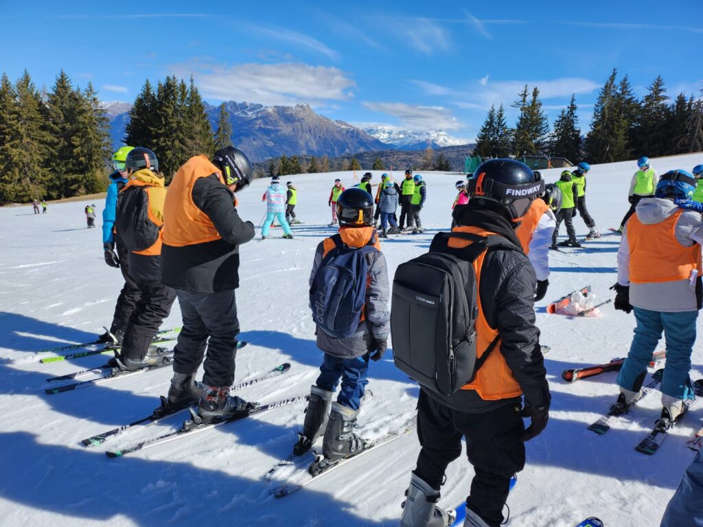 Ebbsfleet Academy students are pictured wearing protective gear in thick snow in Aprica, Italy during a Skiing Trip there in 2023.