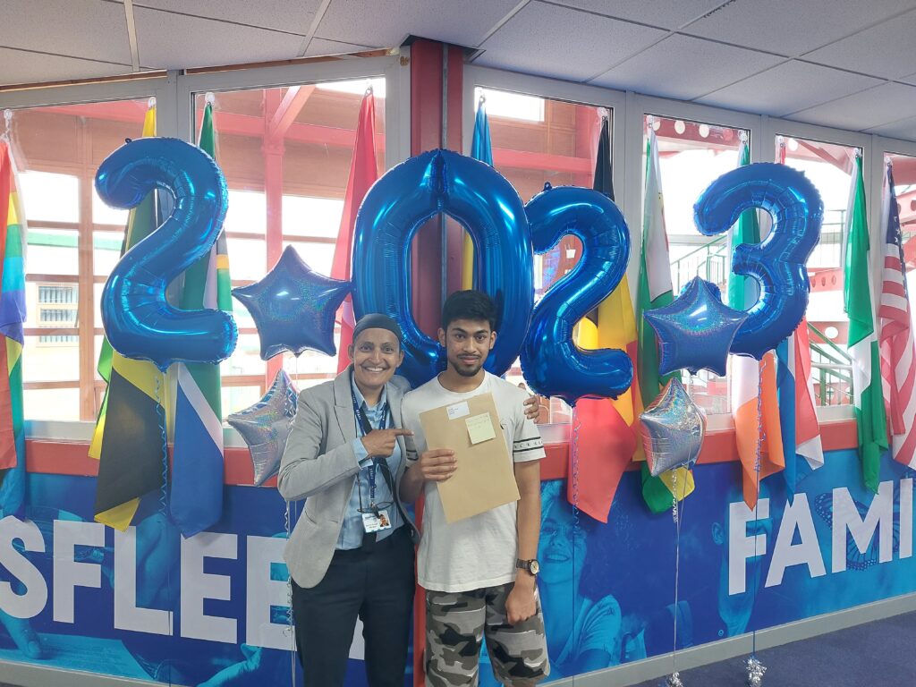 Ms Shergill and a student holding their results