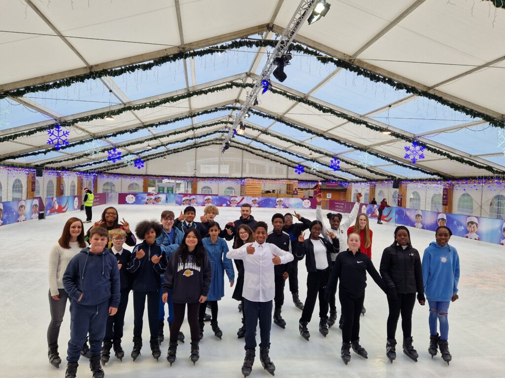 KS3 students stood together at an ice rink