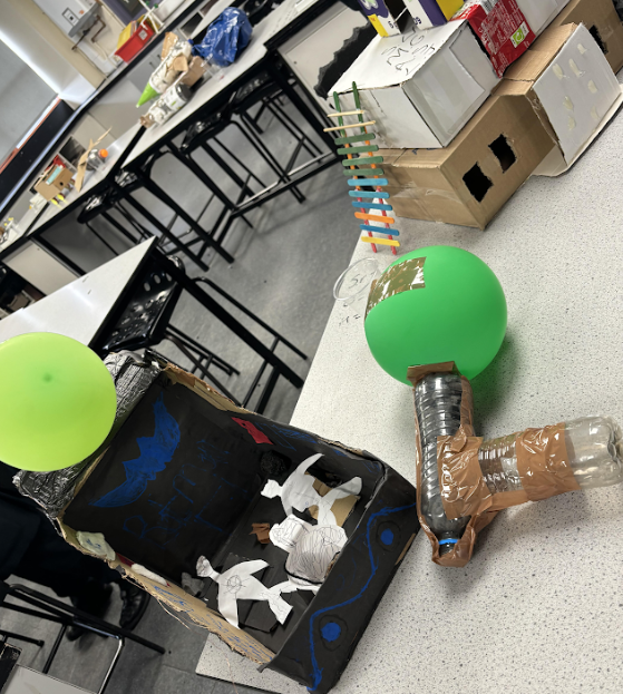 Some models of new forms of transportation created by Years 7 and 8 students, using recycled materials, as part of British Science Week 2024.