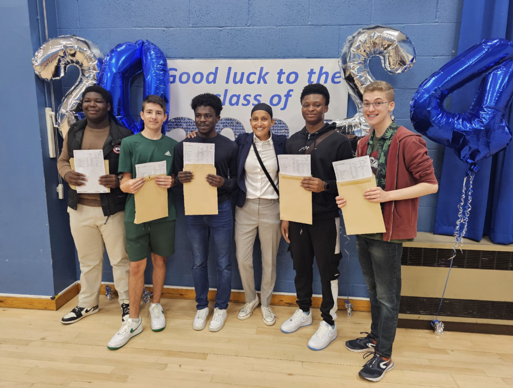 Students holding their results