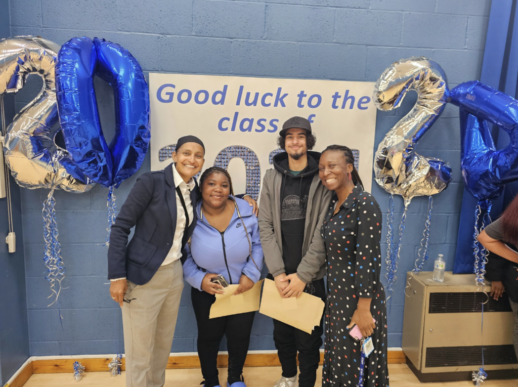 Students holding their results