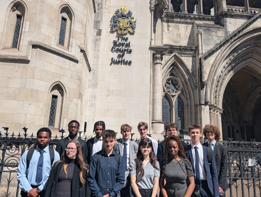 Ebbsfleet Academy students stand for a photo outside of The Royal Courts of Justice building
