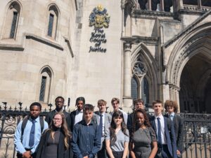 Ebbsfleet Academy students stand for a photo outside of The Royal Courts of Justice building